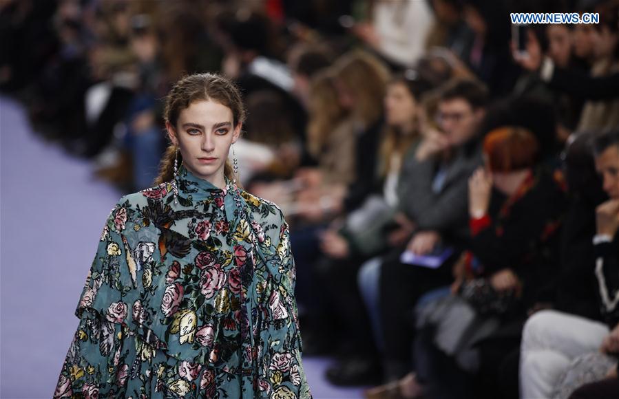 A model showcases a design at the Mulberry show during the London Fashion Week February 2017 collections in London, Britain, on Feb. 19, 2017. 
