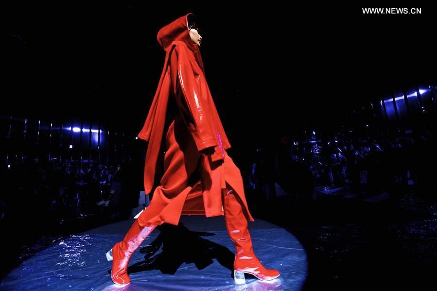 A model presents a creation for ANNAKIKI show during Milan Fashion Week Fall-Winter 2017-18 in Milan, Italy on Feb. 22, 2017.