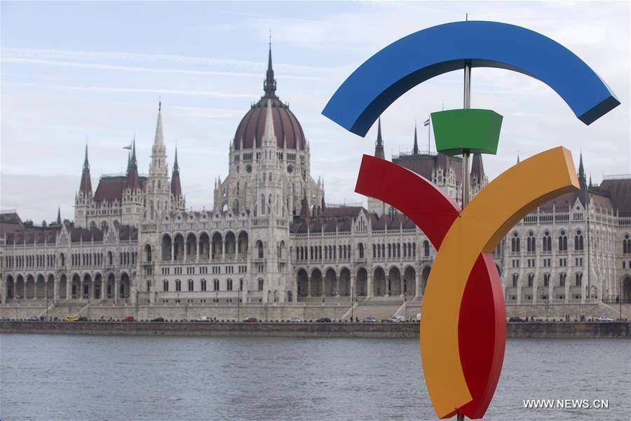 The logo for Olympics 2024 bid is seen at a promotional spot on the bank of the Danube with the Hungarian Parliament in the background in Budapest, Hungary on Feb. 23, 2017. 