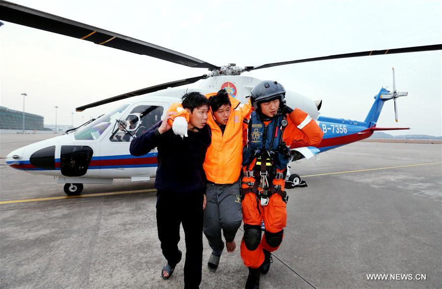 A boat sank 130 sea miles to the east of Zhoushan City, Zhejiang Province, on Friday. A combined rescue of military and civilian efforts salvaged seven people while the rest of 13 crew members remain missing. (Xinhua/Hua Zhibo)