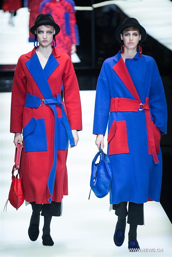 A model presents collections for the fashion house Giorgio Armani during Milan Fashion Week Fall/Winter 2017/2018 in Milan, Italy, Feb. 27, 2017. (Xinhua/Jin Yu)  