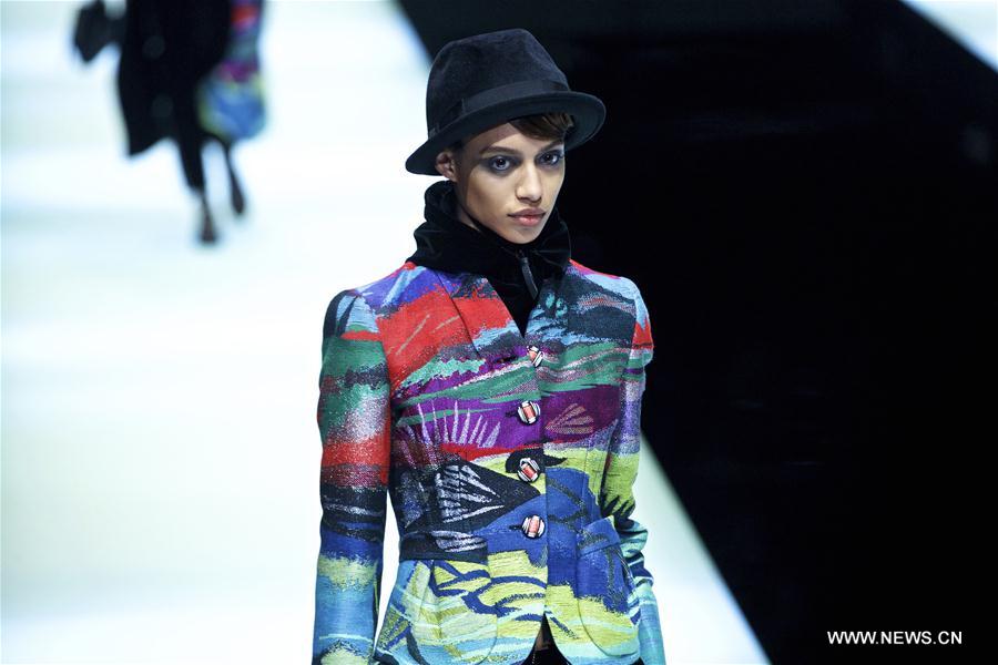 A model presents collections for the fashion house Giorgio Armani during Milan Fashion Week Fall/Winter 2017/2018 in Milan, Italy, Feb. 27, 2017. (Xinhua/Jin Yu)  