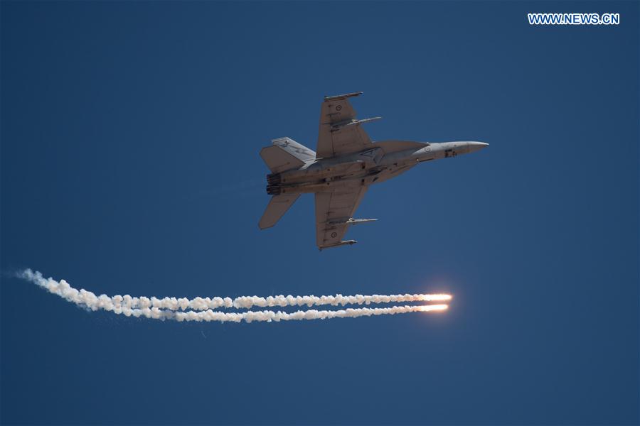 A F-18F Super Hornet performs at the Australian International Aerospace and Defence Exposition at the Avalon Airfield, southwest of Melbourne, Australia, on Feb. 28, 2017.