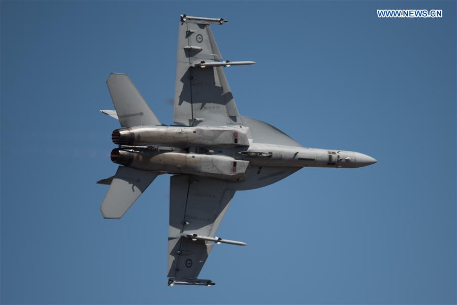 A F-18F Super Hornet performs at the Australian International Aerospace and Defence Exposition at the Avalon Airfield, southwest of Melbourne, Australia, on Feb. 28, 2017.