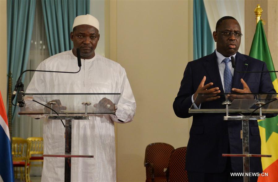 Senegal and The Gambia decided on Thursday to 'give a new impulse' to their bilateral cooperation through arranging regular high-level meetings, Senegalese President Macky Sall said during a joint press conference with his visiting Gambian counterpart Adama Barrow. (Xinhua/Seydi) 