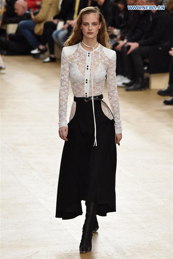 A model presents a creation of Nina Ricci during the Women's Ready-to-Wear Fall Winter 2017/2018 fashion week in Paris, France, on March 4, 2017. 