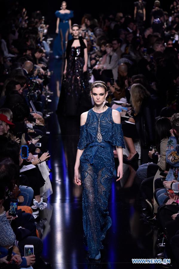 A model presents a creation of Elie Saab during the Women's Ready-to-Wear Fall Winter 2017/2018 fashion week in Paris, France, on March 4, 2017.