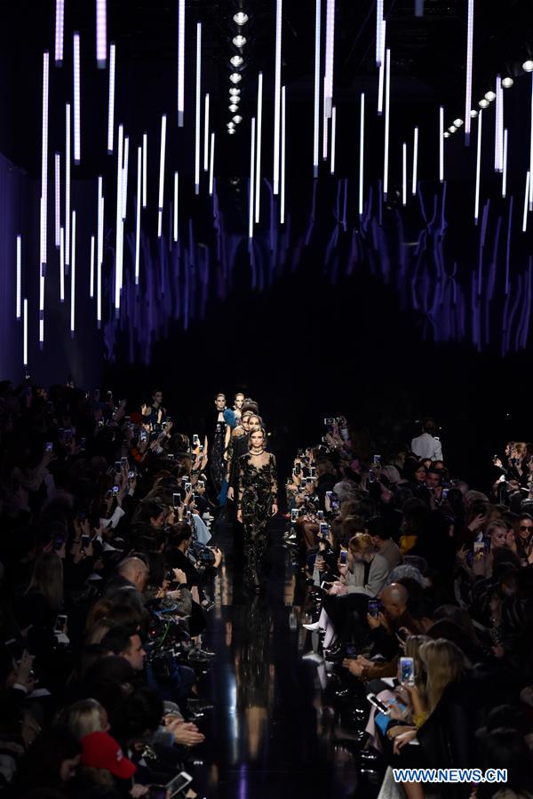 Models present creations of Elie Saab during the Women's Ready-to-Wear Fall Winter 2017/2018 fashion week in Paris, France, on March 4, 2017.