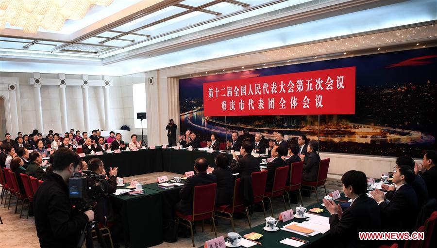 Photo taken on March 6, 2017 shows the scene of a plenary meeting of the 12th National People's Congress (NPC) deputies from Chongqing Municipality during the annual NPC session in Beijing, capital of China. The meeting was opened to media. (Xinhua/Wu Xiaoling) 