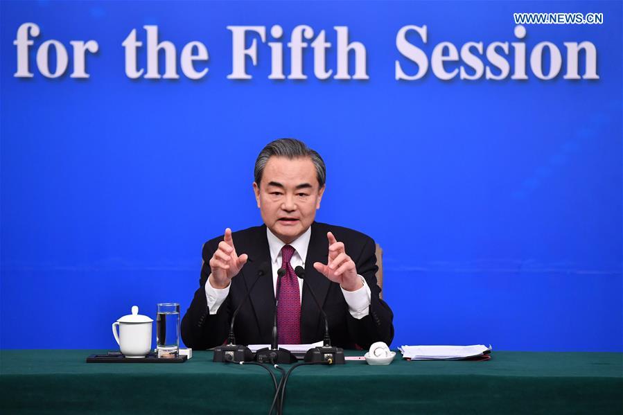 Chinese Foreign Minister Wang Yi answers questions on China's foreign policy and foreign relations at a press conference for the fifth session of the 12th National People's Congress in Beijing, capital of China, March 8, 2017.
