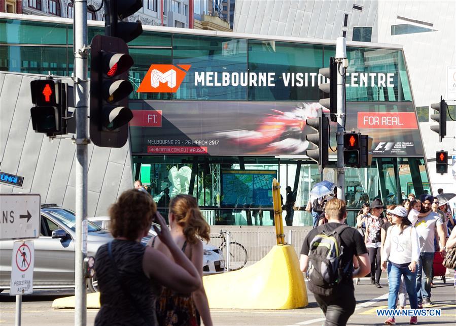 AUSTRALIA-MELBOURNE-TRAFFIC LIGHTS-FEMALE FIGURE
