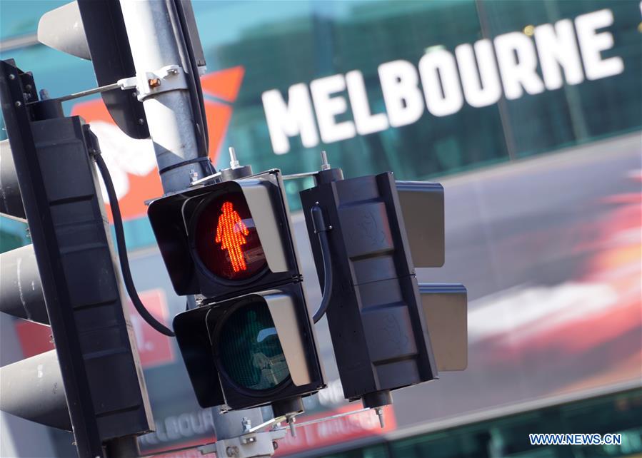 AUSTRALIA-MELBOURNE-TRAFFIC LIGHTS-FEMALE FIGURE