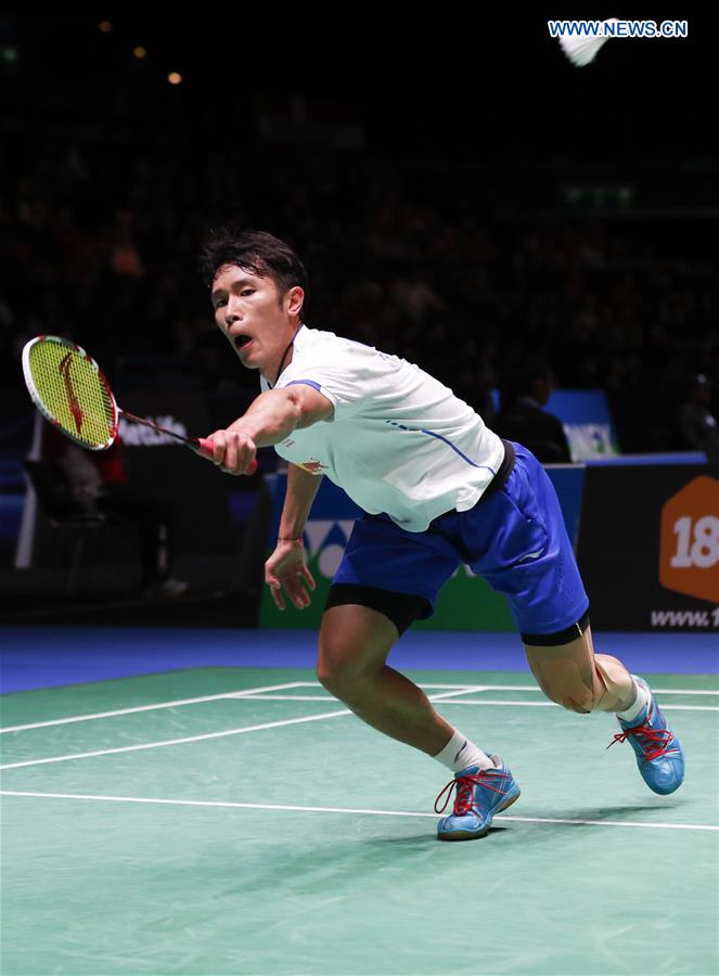 China's Tian Houwei returns the shuttlecock during the men's singles first round match with Tommy Sugiarto of Indonesia at All England Open Badminton 2017 in Birmingham, Britain on March 8, 2017. 