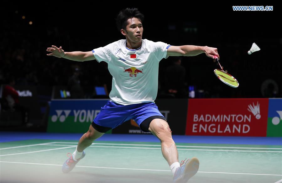 China's Tian Houwei returns the shuttlecock during the men's singles first round match with Tommy Sugiarto of Indonesia at All England Open Badminton 2017 in Birmingham, Britain on March 8, 2017. 