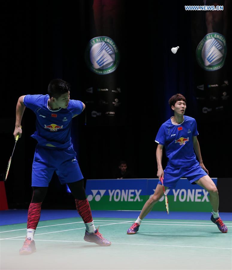 China's Li Junhui (R) / Liu Yuchen compete during the men's doubles first round match with Fajar Alfian/Muhammad Rian Ardianto of Indonesia at All England Open Badminton 2017 in Birmingham, Britain on Mar. 8, 2017.