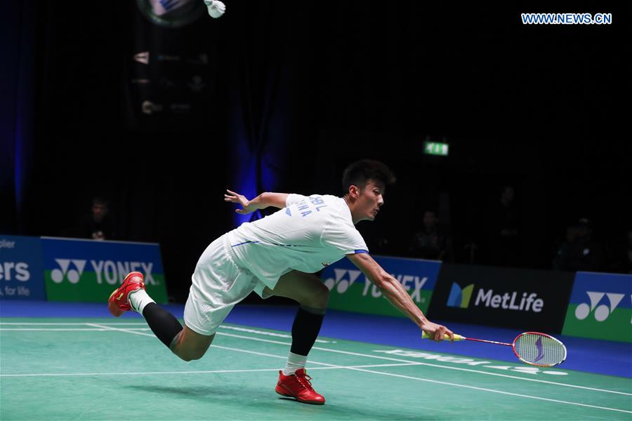 Chen Long of China returns the shuttlecock during the men's singles first round match with Marc Zwiebler of Germany at All England Open Badminton Tournament 2017 in Birmingham, Britain on March 8, 2017.