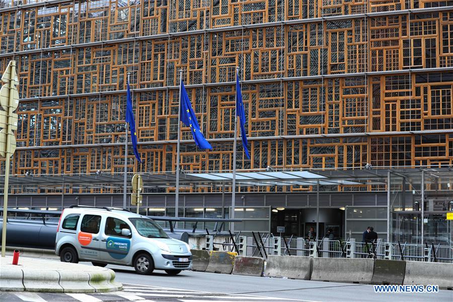 A van passes by the Europa building in Brussels, Belgium, on March 10, 2017. The European Council held its spring summit from March 9 to March 10. It was the first European Council summit held in the Europa building after a decade-long construction period.
