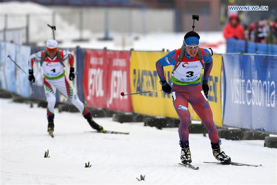 Alexandr Loginov(R) of Russia competes during the Men's 10km sprint race of IBU Cup 2016/2017 in Otepaa, Estonia, March 11, 2017. 