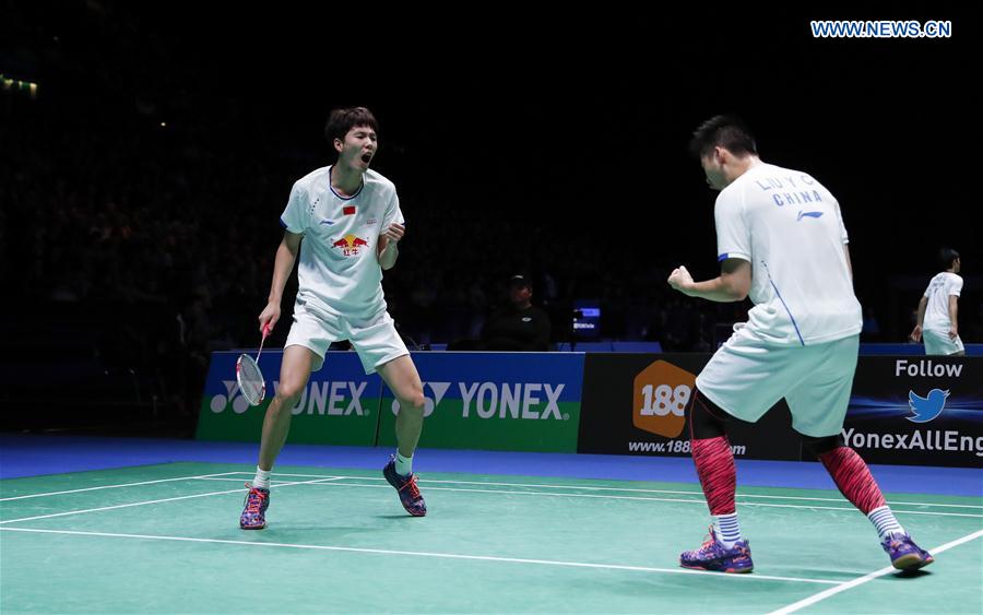 Li Junhui (L)/Liu Yuchen of China celebrate after the men's doubles semifinal against their teammates Liu Cheng/Zhang Nan at All England Open Badminton Championships 2017 in Birmingham, Britain on Mar. 11, 2017. 