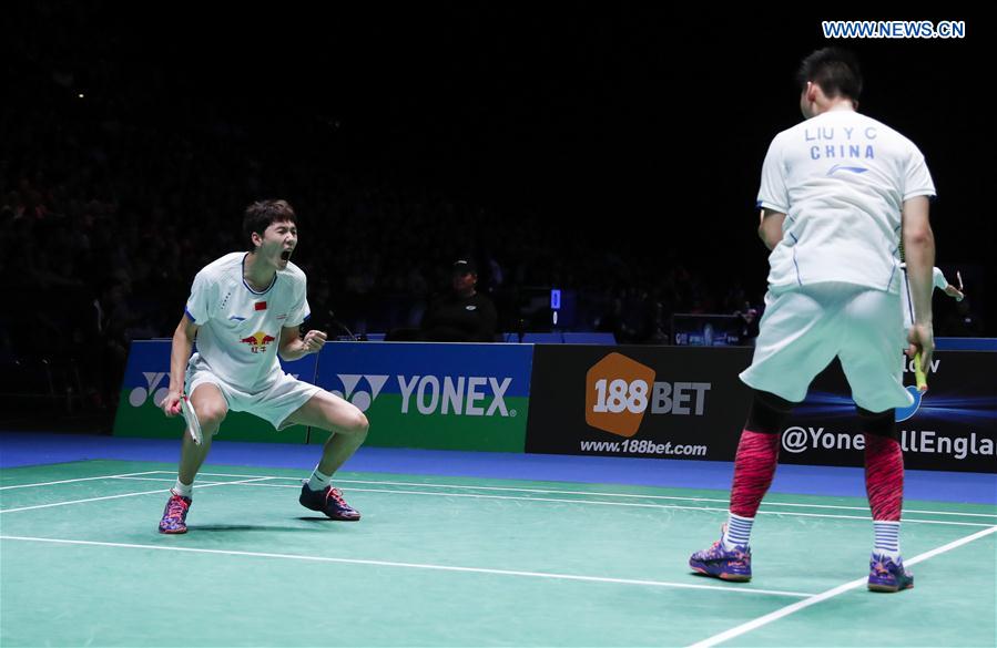 Li Junhui (L)/Liu Yuchen of China celebrate after the men's doubles semifinal against their teammates Liu Cheng/Zhang Nan at All England Open Badminton Championships 2017 in Birmingham, Britain on Mar. 11, 2017. 