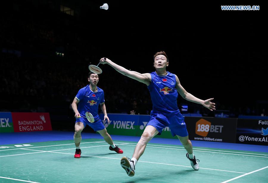 Liu Cheng/Zhang Nan (R) of China compete during the men's doubles semifinal against their teammates Li Junhui/Liu Yuchen at All England Open Badminton Championships 2017 in Birmingham, Britain on Mar. 11, 2017. 