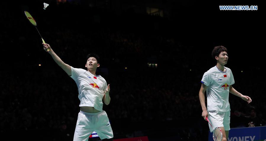 Li Junhui (R)/Liu Yuchen of China compete during the men's doubles semifinal against their teammates Liu Cheng/Zhang Nan at All England Open Badminton Championships 2017 in Birmingham, Britain on Mar. 11, 2017. 