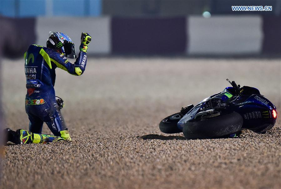 Italian rider Valentino Rossi of Movistar Yamaha MotoGP reacts after crashing out during the pre-season test at the Losail International Circuit in Qatar's capital Doha on March 11, 2017, ahead of Grand Prix of Qatar which will be held from March 23 to 26. Italian rider Valentino Rossi of Movistar Yamaha MotoGP reacts after crashing out during the pre-season test at the Losail International Circuit in Qatar's capital Doha on March 11, 2017, ahead of Grand Prix of Qatar which will be held from March 23 to 26.