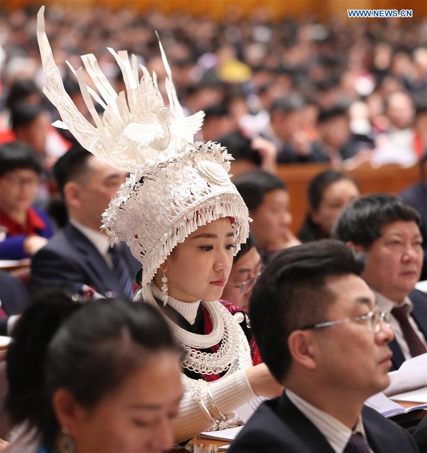 Deputies to China's 12th National People's Congress (NPC) attend the opening meeting of the fifth session of the 12th NPC at the Great Hall of the People in Beijing, capital of China, March 5, 2017. 