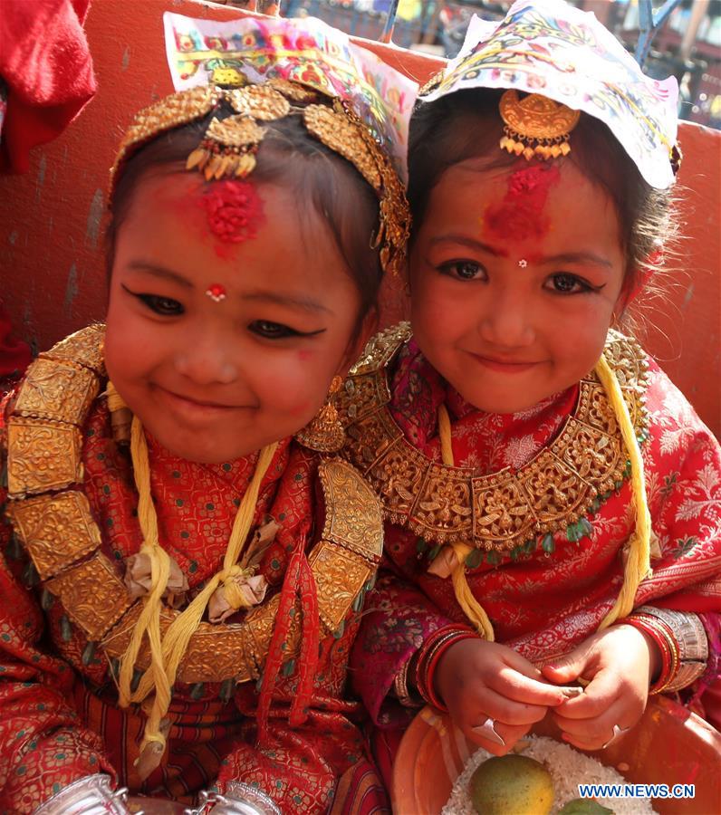 Little girls from Newar community attend a Bel Bibaha ceremony in Kavre,on the outskirts of Kathmandu,capital of Nepal, March 15, 2017. Bel Bibaha, or Ihi, is a marriage ceremony in the Newar community of Nepal in which pre-adolescent girls are 'married' to the bael fruit (wood apple). Normally Newar girls marry thrice in their life as first marriage with Bael fruit, second with sun and third with human.