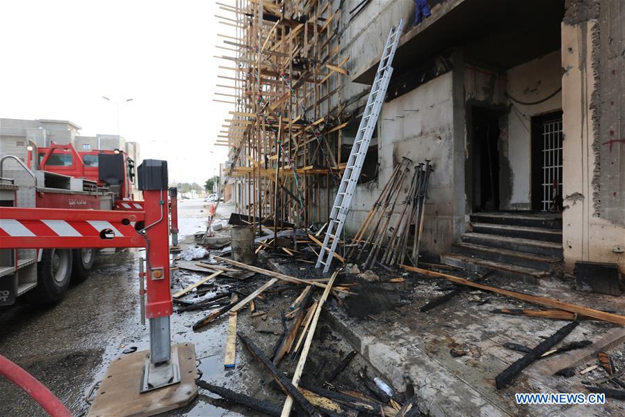 Photo taken on March 15, 2017 shows the damaged building of government of national salvation's TV channel which was set on fire by a group of gunmen in Tripoli, Libya. Violent clashes erupted in the Libyan capital Tripoli since early Tuesday morning and lasted to Wednesday morning between rival militias, according to witnesses. The fighting is between two militias loyal to the two rival governments in Tripoli: the UN-backed government of national accord and the deposed government of national salvation that is attempting to take over the city and get back to power. (Xinhua/Hamza Turkia) 
