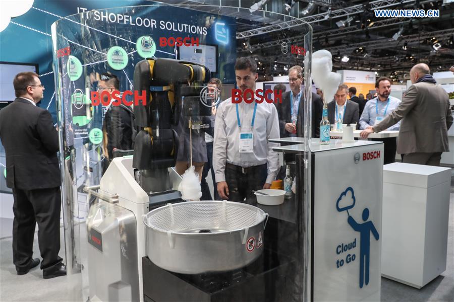Photo taken on March 15, 2017 shows a device to make cotton candy at the Bosch ConnectedWorld 2017 in Berlin, capital of Germany. 