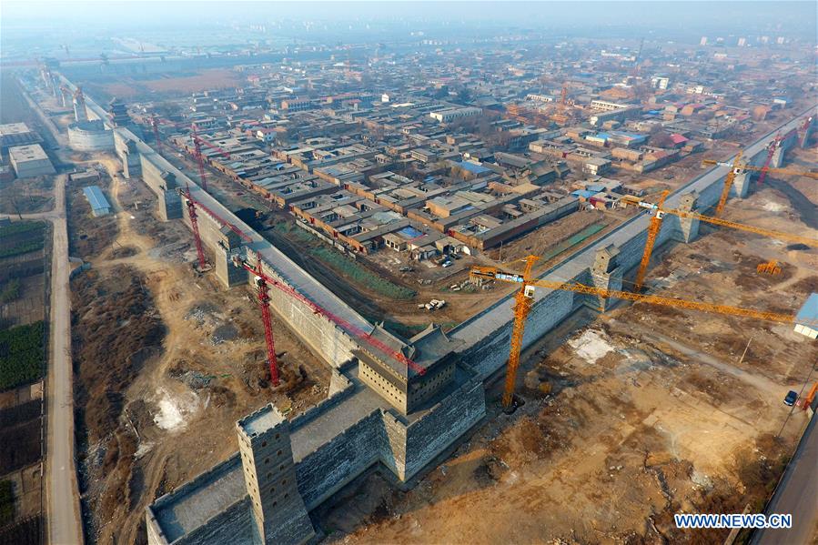Construction cranes are busy at work for the restoration of the ancient county seat of Taiyuan, in Jinyuan District of Taiyuan City, capital of north China's Shanxi Province. Established in 1375, the ancient county seat is well preserved over the last 600 years. The restoration project went smoothly.(Xinhua/Zhan Yan) 