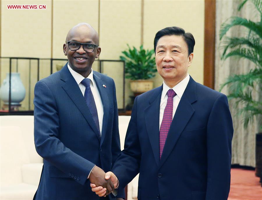 Chinese Vice President Li Yuanchao (R) meets with Burundian Minister of External Relations and International Cooperation Alain Aime Nyamitwe, in Beijing, capital of China, March 16, 2017. (Xinhua/Yao Dawei)