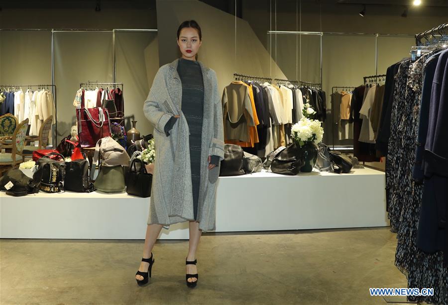 A model presents a creation of designer Zhang Yichao at an inauguration ceremony of an incubator of fashion and innovative talents in Hangzhou, capital of east China's Zhejiang Province, March 17, 2017. The talents incubator is jointly developed by fashion college of Zhejiang Sci-tech University, School of Fashion of Wuhan Textile University and a customization platform. (Xinhua/Chen Jianli) 