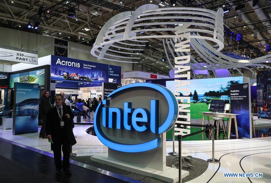 Photo taken on March 20, 2017 shows a view of the Intel booth during the CeBIT 2017 in Hanover, Germany. The world's leading trade fair showcasing IT and communications products and solutions CeBIT 2017 kicked off on Monday and will last until March 24. The show with the theme 'd!conomy - no limits' this year attracted around 3,000 exhibitors from 70 countries and regions and is expected to attract some 200,000 visitors. (Xinhua/Shan Yuqi) Photo taken on March 20, 2017 shows a view of the Intel booth during the CeBIT 2017 in Hanover, Germany. The world's leading trade fair showcasing IT and communications products and solutions CeBIT 2017 kicked off on Monday and will last until March 24. The show with the theme 'd!conomy - no limits' this year attracted around 3,000 exhibitors from 70 countries and regions and is expected to attract some 200,000 visitors. (Xinhua/Shan Yuqi)