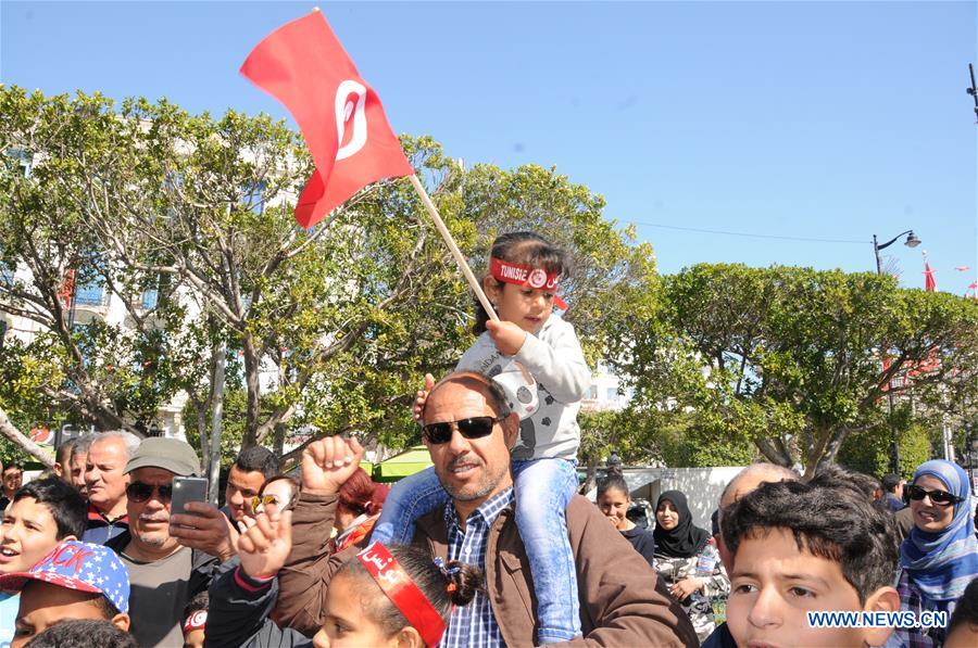 People celebrate the 61st anniversary of Independence Day in Tunis, Tunisia, March 20, 2017. (Xinhua/Adel Ezzine) 