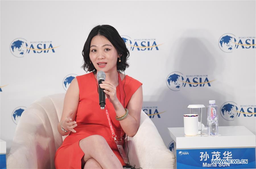 Maria Sun, Chief Operating Officer of Chinese online travel agent Ctrip, addresses the session of 'Surviving the Capital Crunch' during the Boao Forum for Asia Annual Conference 2017 in Boao, south China's Hainan Province, March 23, 2017. 