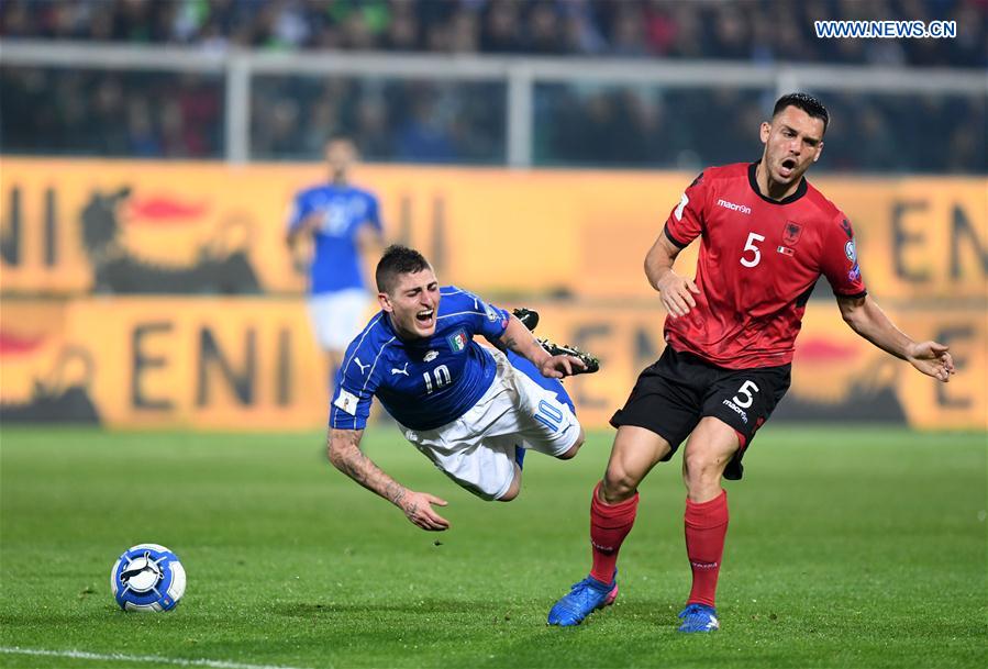 Marco Verratti of Italy (L) competes for the ball with Frederic Veseli of Albania during the FIFA 2018 World Cup Qualifying soccer match between Italy and Albania in Palermo, Italy, on March 24, 2017.