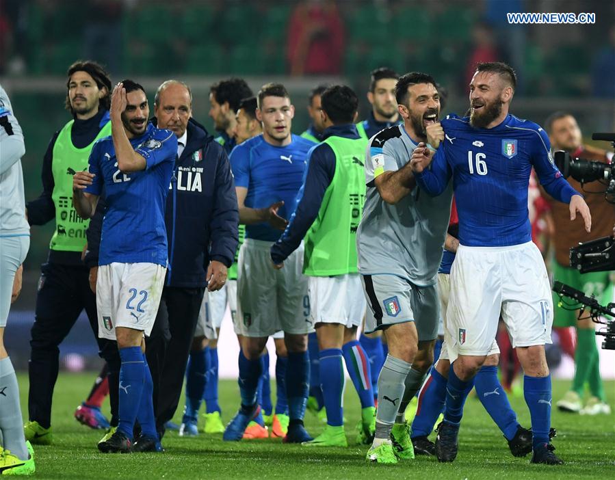 Italy's players celebrate after the FIFA 2018 World Cup Qualifying soccer match between Italy and Albania in Palermo, Italy, on March 24, 2017. 