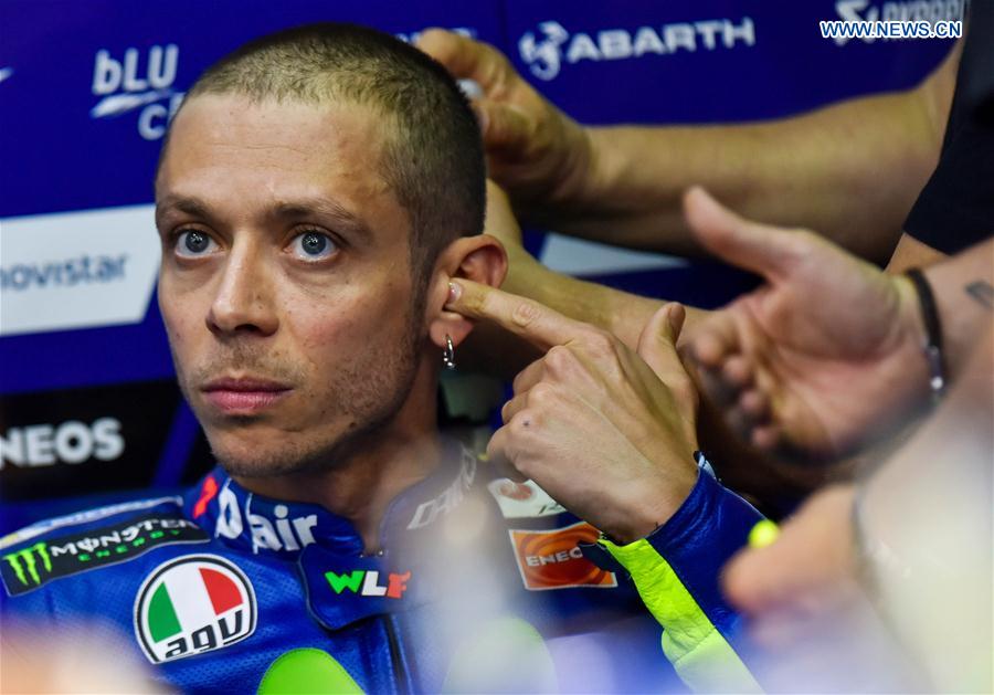 Italian MotoGP rider Valentino Rossi of Movistar Yamaha MotoGP looks on in box before the qualifying session 2 during 2017 FIM MotoGP Grand Prix of Qatar at the Losail International Circuit in Doha, capital of Qatar, on March 24, 2017.