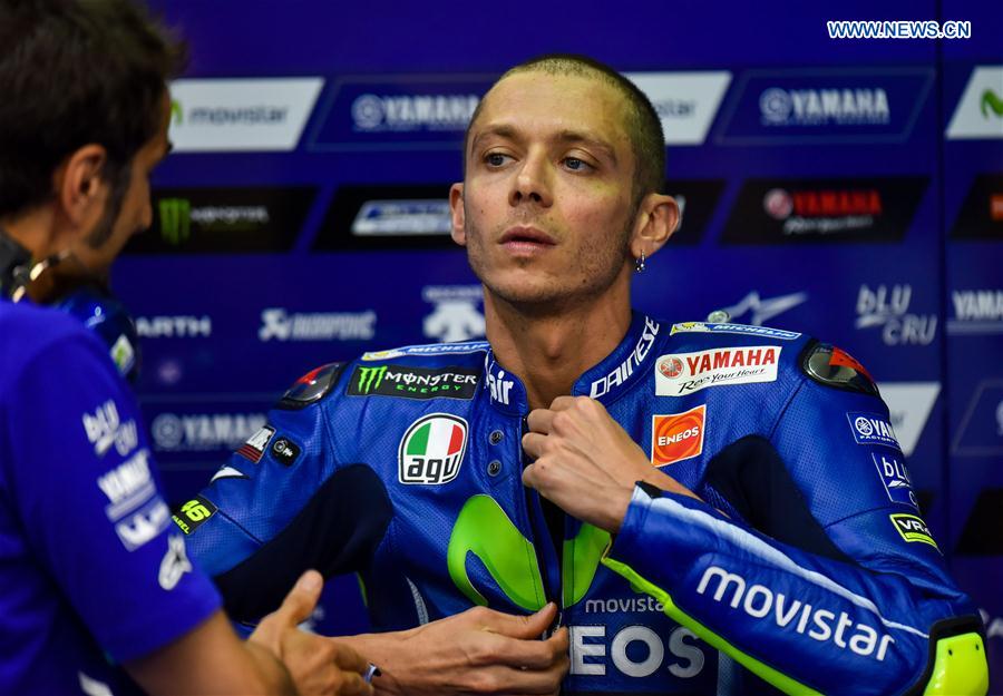Italian MotoGP rider Valentino Rossi of Movistar Yamaha MotoGP looks on in box before the qualifying session 2 during 2017 FIM MotoGP Grand Prix of Qatar at the Losail International Circuit in Doha, capital of Qatar, on March 24, 2017. 