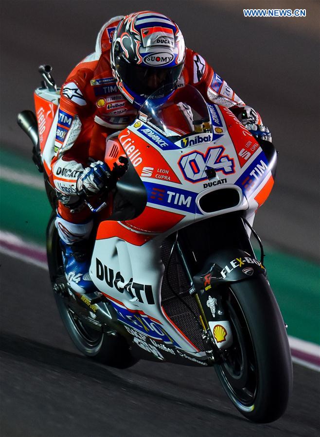 Italian MotoGP rider Andrea Dovizioso of Ducati Team competes in the free-practice 2 during 2017 FIM MotoGP Grand Prix of Qatar at the Losail International Circuit in Doha, capital of Qatar, on March 24, 2017. 