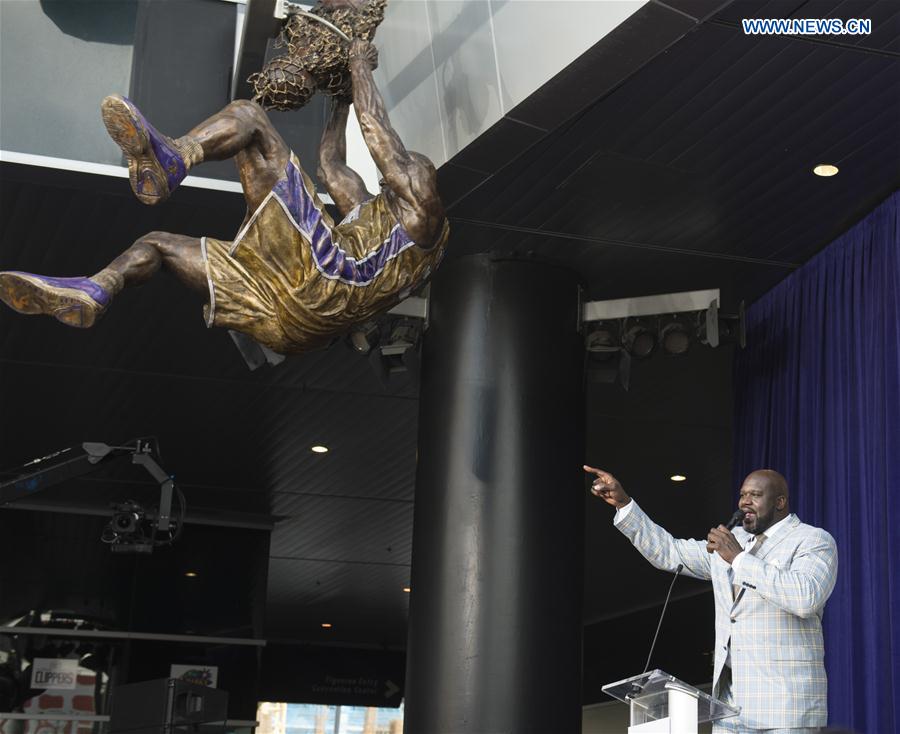 Los Angeles Lakers former center Shaquille O'Neal speaks during the ceremony to unveil his statue at Staples Center in Los Angeles, the United States, March 24, 2017.