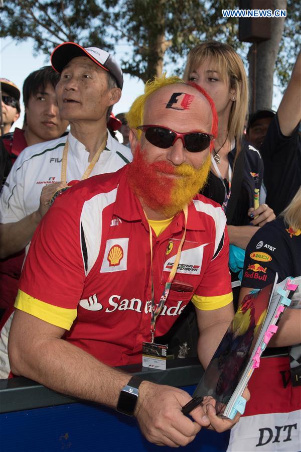 Australian Formula One Grand Prix spectators wait at 'Melbourne Walk' for the autographs before the third practice session ahead of the Australian Formula One Grand Prix at Albert Park circuit in Melbourne, Australia on March 25, 2017. Australian Formula One Grand Prix spectators wait at 'Melbourne Walk' for the autographs before the third practice session ahead of the Australian Formula One Grand Prix at Albert Park circuit in Melbourne, Australia on March 25, 2017.