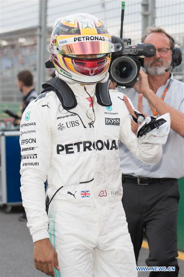 Mercedes AMG Petronas Formula One driver Lewis Hamilton of Britain celebrates after winning the qualifying session of the Australian Formula One Grand Prix at Albert Park circuit in Melbourne, Australia on March 25, 2017. Lewis Hamilton will start from the pole position. The Australian Formula One Grand Prix will take place in Melbourne on March 26. (Xinhua/Bai Xue) Mercedes AMG Petronas Formula One driver Lewis Hamilton of Britain celebrates after winning the qualifying session of the Australian Formula One Grand Prix at Albert Park circuit in Melbourne, Australia on March 25, 2017. Lewis Hamilton will start from the pole position. The Australian Formula One Grand Prix will take place in Melbourne on March 26. (Xinhua/Bai Xue)