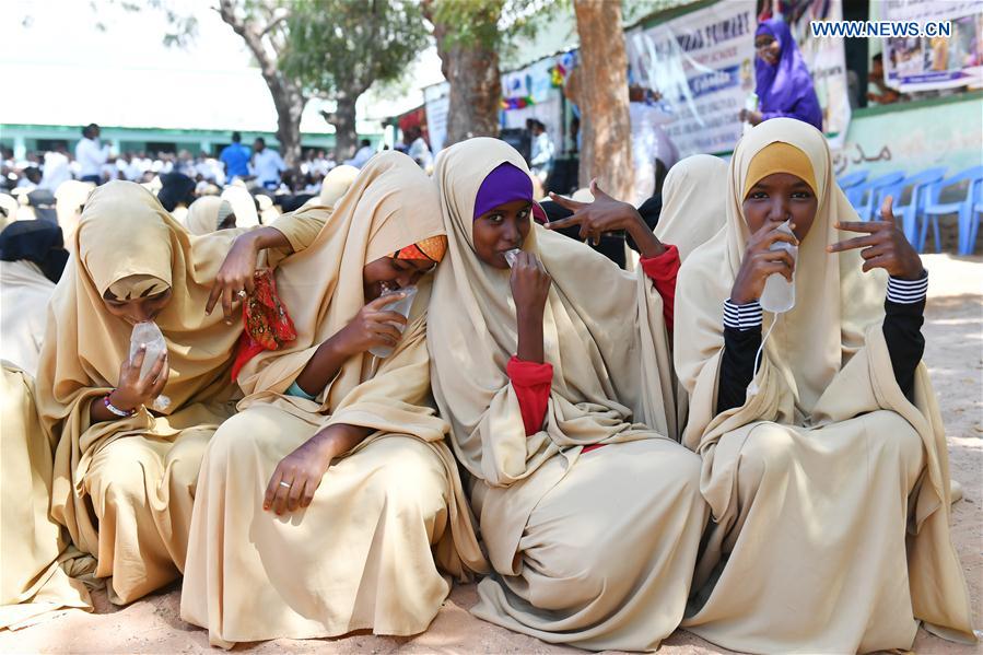 Somali girls drink packed drinking water at a school in Mogadishu, capital of Somalia, on March 22, 2017. 