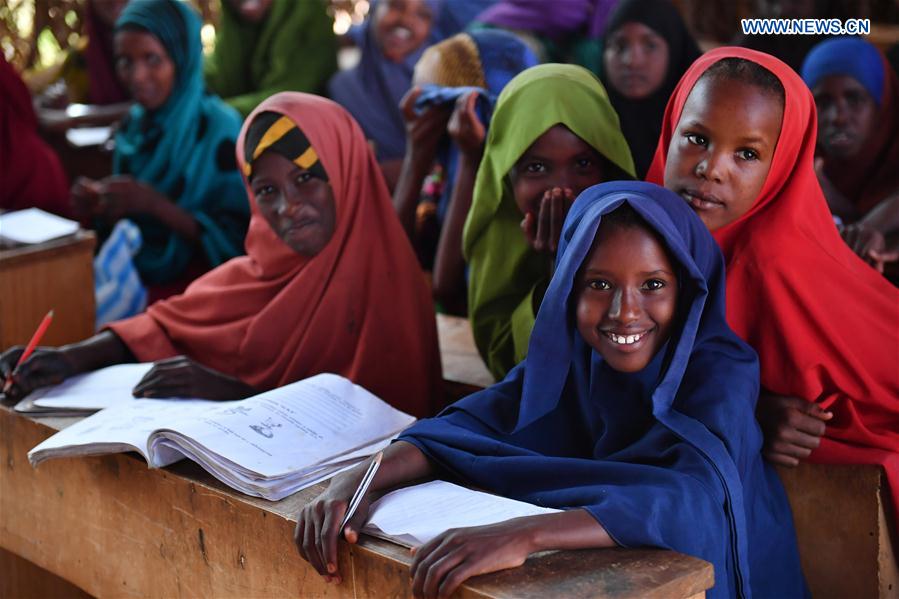 Photo taken on March 21, 2017 shows students who fled home from drought at Kabasa Primary School in Doolow, a border town with Ethiopia, Somalia. 