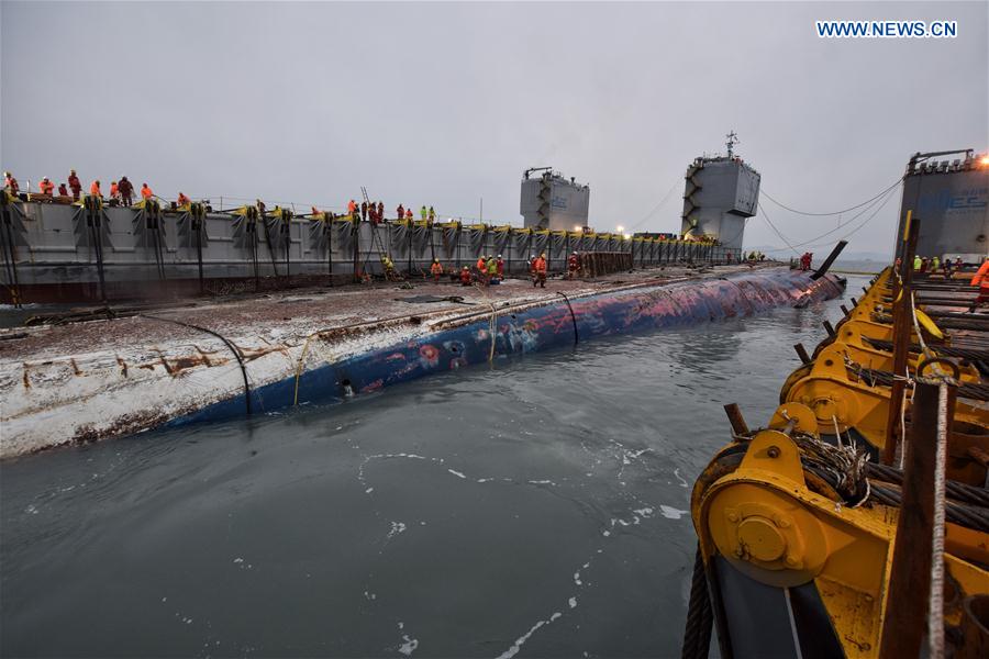 The sunken passenger ferry Sewol is seen in waters off Jindo Island, South Korea, March 23, 2017. 