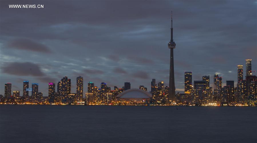 The Canadian National Tower is pictured with light off during the Earth Hour in Toronto, Canada, March 25, 2017.
