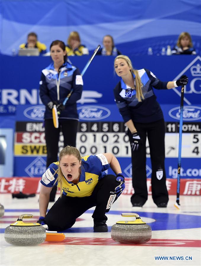 Sara McManus (front) of Sweden competes during the bronze medal match against Scotland at the CPT World Women's Curling Championship 2017, in Beijing, capital of China, March 26, 2017.